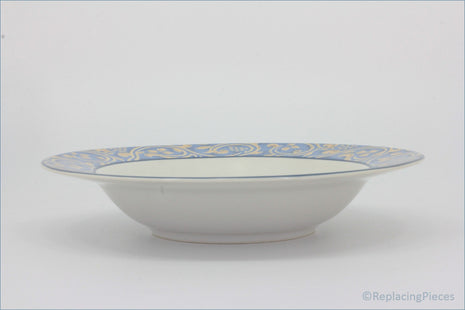 BHS - Seville - 9 1/4" Rimmed Bowl - White ceramic bowl with blue and yellow decorative rim on a white background