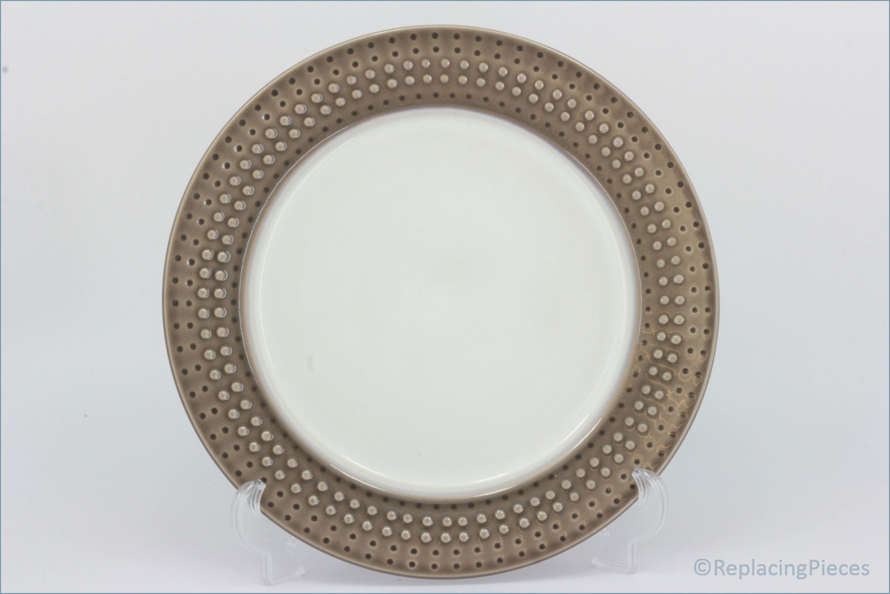 Denby - Intro (Mocha) - Dinner Plate  - Decorative ceramic plate with a brown rim featuring small dos on a white background.