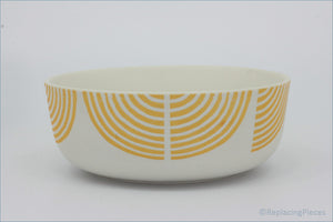 Habitat - Block Print - Cereal Bowl - White bowl with orange circular pattern on a white background