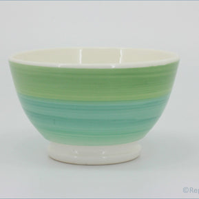 Habitat - Circles - Cereal Bowl  - Green and white ceramic bowl on a white background