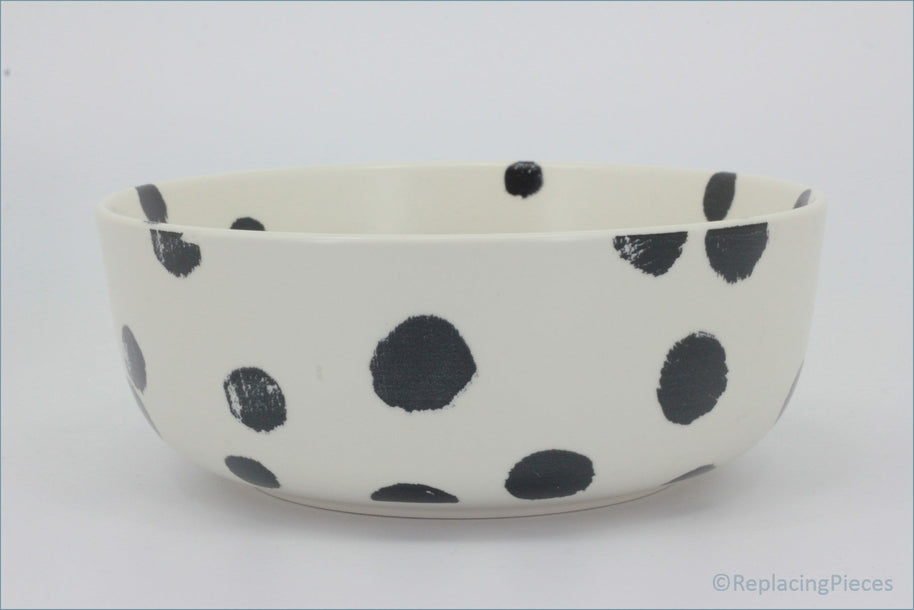 Habitat - Global - Cereal Bowl - White ceramic bowl with black polka dots on a white background