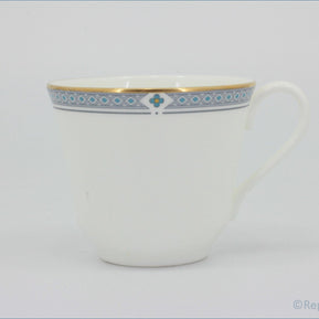 Marks & Spencer - Felsham - Teacup - White teacup with decorative blue and gold rim on a white background