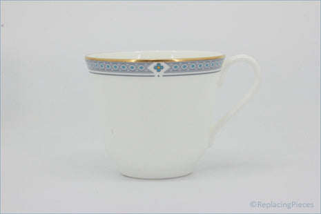Marks & Spencer - Felsham - Teacup - White teacup with decorative blue and gold rim on a white background