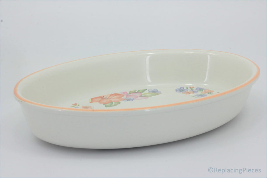 Marks & Spencer - Orange Blossom - Oval Roaster - White ceramic dish with floral patterns on a light gray background