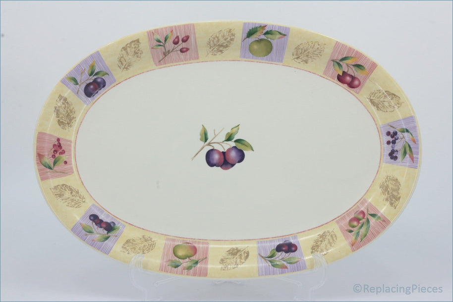 Marks & Spencer - Wild Fruits - 16 1/4" Oval Platter - Decorative oval placemat with fruit design on a white background
