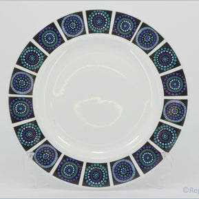 Midwinter - Madeira - Dinner Plate  - White plate with decorative purple and blue circular patterns on a white background
