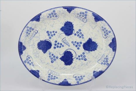 Poole - Blue Vine - 14 3/8" Oval Platter - Decorative plate with blue grape pattern on a white background