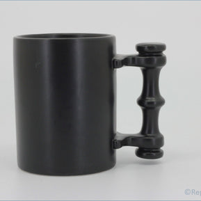 Portmeirion - Mugs - Plain Black Tankard - Black mug with a unique handle design on a white background