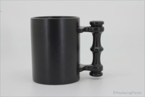 Portmeirion - Mugs - Plain Black Tankard - Black mug with a unique handle design on a white background