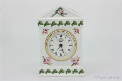 Portmeirion - Pomona - Roman Clock - Decorative clock with floral designs on a white background