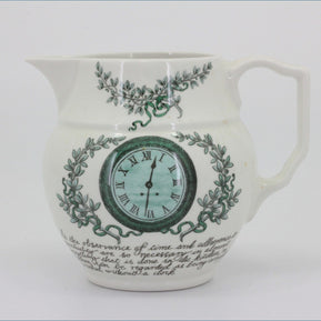 Portmeirion - Victorian Cooks Collection - Milk Jug - Decorative ceramic mug with clock design and text on a white background