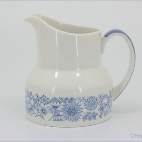 Royal Doulton - Cranbourne (TC1032) - Milk Jug - White ceramic pitcher with blue floral patterns on a white background