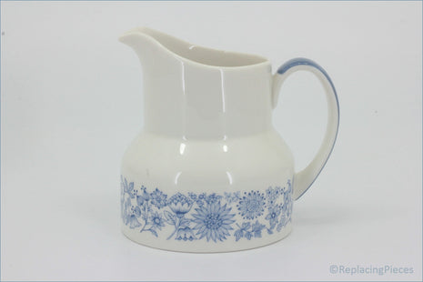 Royal Doulton - Cranbourne (TC1032) - Milk Jug - White ceramic pitcher with blue floral patterns on a white background
