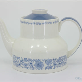 Wedgwood - Glen Mist (Susie Cooper Design) - Milk Jug (Footed) - White teapot with blue floral patterns on a white background