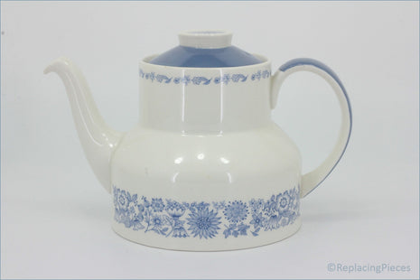Wedgwood - Glen Mist (Susie Cooper Design) - Milk Jug (Footed) - White teapot with blue floral patterns on a white background