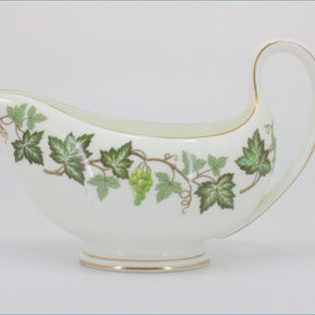 Wedgwood - Santa Clara - Gravy Boat - Decorative ceramic gravy boat with green leaf pattern on a white background